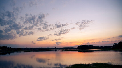 Fototapeta na wymiar By the reservoir in the evening