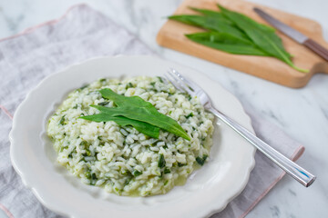 Spring food; Delicious risotto with asparagus and wild garlic