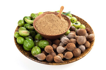 Indian Gooseberry ,terminalia chebula , terminalia bellirica and powder isolated on white background.