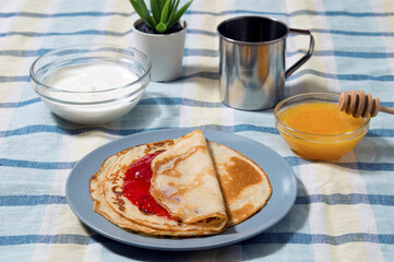 pancakes with jam, sour cream and honey
