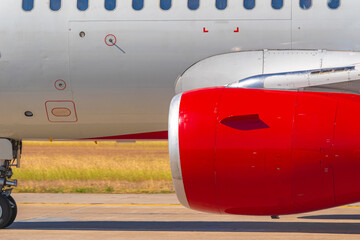 Fototapeta premium Close up of passenger airplane parked in airport
