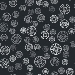 Grey Alloy wheel for a car icon isolated seamless pattern on black background. Vector