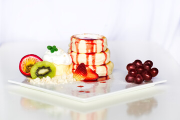 Cakes, sweets, pancakes and cream