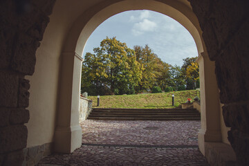 Fototapeta premium Przemysl or Casimir Castle, XIV century is a renaissance citadel in Przemysl, Poland. It located on the Castle Hill. View of the courtyard of the fortress from the entrance arch.