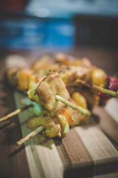 Close up image of traditional chicken kebabs or sosaties that was cooked on a braai in south africa