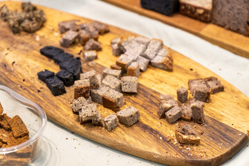 close-up of a promotion desk with organic gluten free vegan bread on a wooden desk.