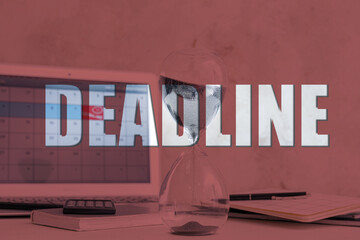 Double exposure of word DEADLINE and hourglass at workplace