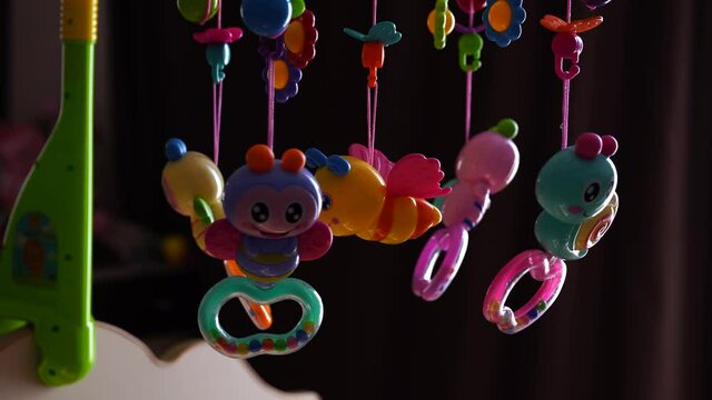 Children's toy. Carousel with bees and butterflies.