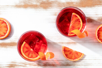Cocktails with blood orange juice, overhead shot with copy space