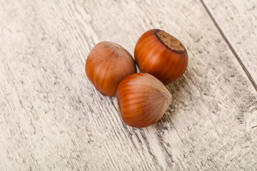 Obraz premium Hazelnut heap isolated over background