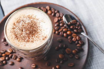 Glass of tasty latte, closeup