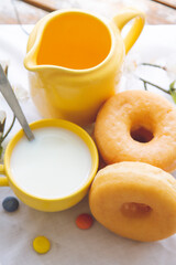 breakfast or snack with donuts and cup of milk