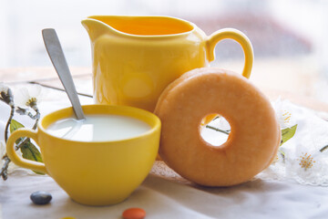 breakfast or snack with donuts and cup of milk