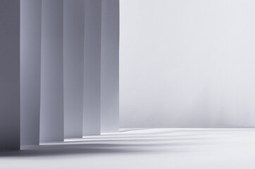 Abstract white grey background with contrast perspective of stripes, light and shadow and copy...