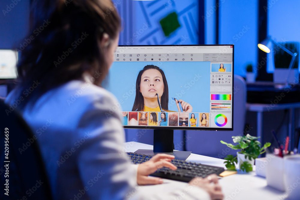 Poster freelancer retoucher woman working overtime on laptop computer with photo editing software. graphic 