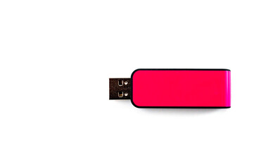 A pink USB flash drive with a plastic case, shot against a white background.