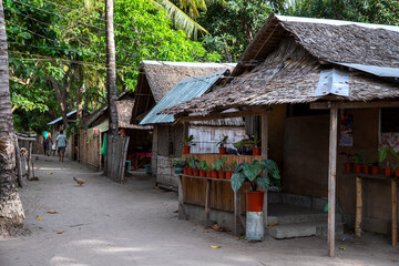 Rustic wooden huts street asian village. Native lifestyle travel photo. Traditional lifestyle of...