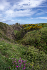Fototapeta na wymiar Dunnottar Castle is a ruined medieval fortress located upon a rocky headland on the northeastern coast of Scotland