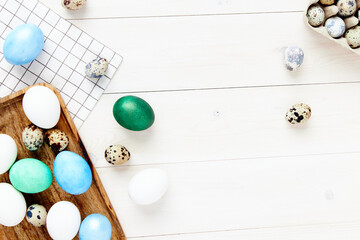 Easter eggs laid out on a board and wooden foundation traditions holidays gifts