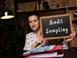 Financial concept meaning Audit Sampling with sign on chalkboard.