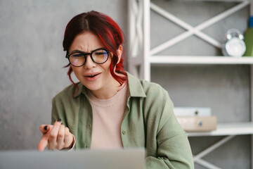 Confused frustrated young attractive young woman
