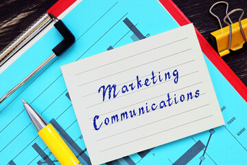  Financial concept about Marketing Communications with phrase on the piece of paper.