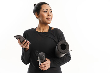 Smiling african american woman using cellphone
