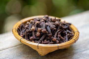 Clove an on wooden background.