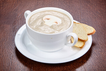 Mushroom cream soup with bread