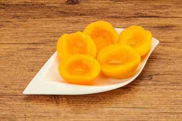 Marinated peaches fruit in the bowl