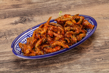 Canned anchovy in tomato sauce