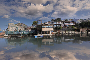 Fototapeta premium (Istanbul - Turkey - February 23, 2021) Sile Town, reflections in the sea in a cloudy sky.