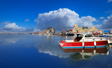 (Istanbul - Turkey - February 23, 2021) Sile Town, reflections in the sea in a cloudy sky.