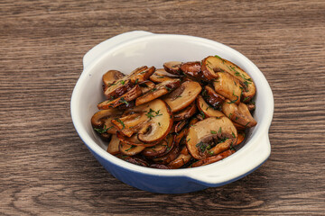 Roasted champignon with herbs and spices