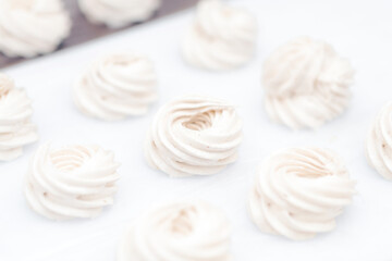 Obraz na płótnie Canvas vanilla marshmallows, handmade sweets, homemade baked goods.