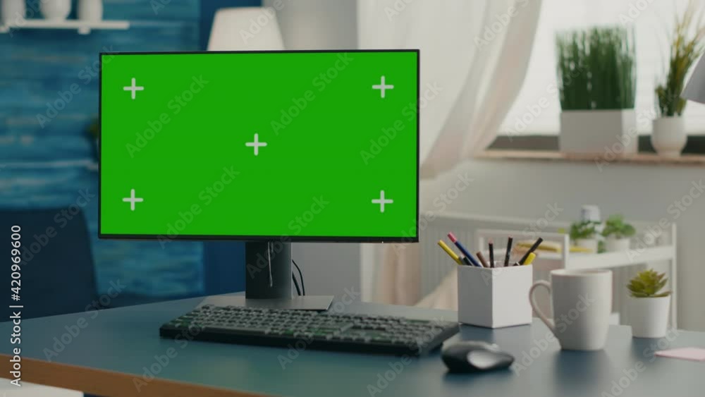 Poster empty living room with modern chroma key green screen mock up computer set up for online videocall m