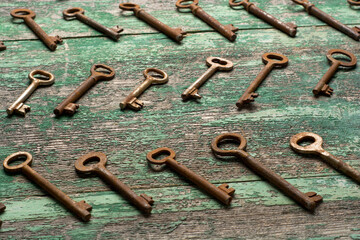 Vintage keys on wooden table top view