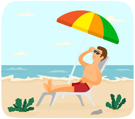 Obraz na płótnie Canvas Smiling guy is sitting in sun lounger under umbrella and tanning. Man is sunbathing at resort