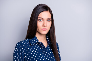 Photo of strict brunette girl wear blue blouse isolated on grey color background