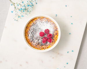 Creme brulee. Traditional French vanilla cream dessert. Burned cream, burnt creme or Trinity cream. Spanish crema catalana, rich custard base topped with layer of hardened caramelized sugar.