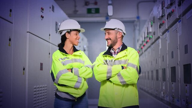 Engineer checking and inspecting at MDB panel , working with electric switchboard to check  medium Voltage Switchgear working in Main Distribution Boards factory.