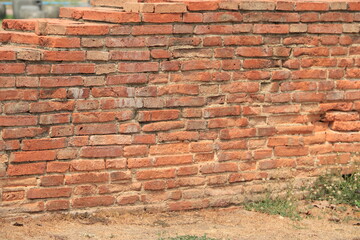Old red brick wall in a background, texture.