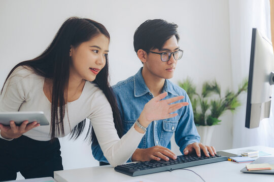 Programmer and Developer coding software application.
