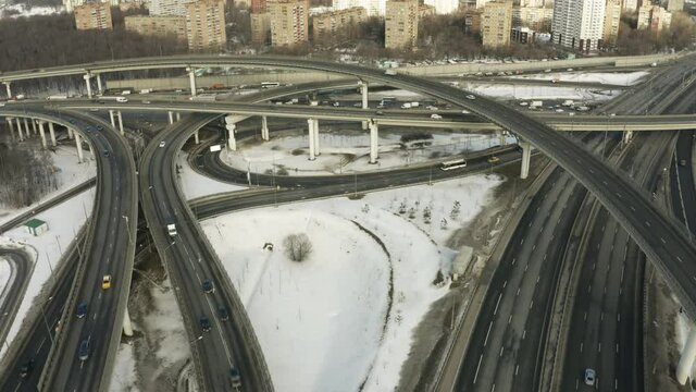 Big road interchange and traffic jam in winter, aerial view. Moscow, Russia