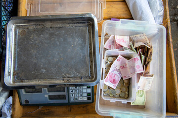 marketplace and weighing, money box with turkish liras