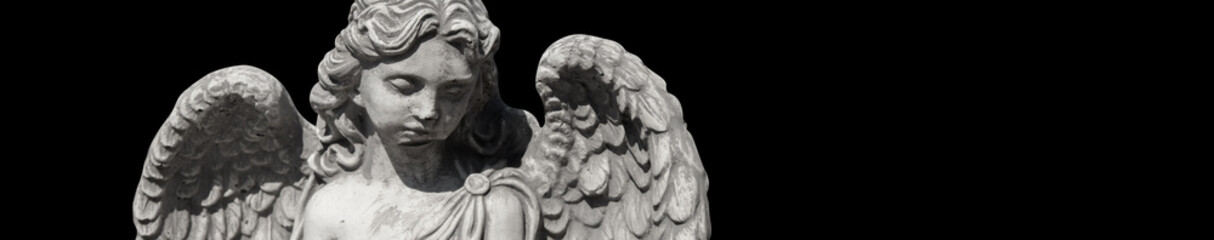 Ancient statue isolated on black background. Sad angel as symbol of death and end of human life.