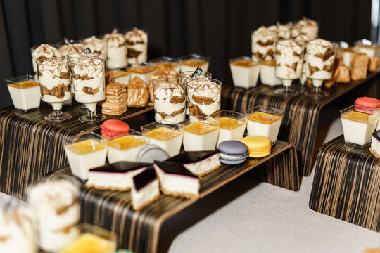 Many different desserts are on the table.