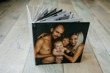 example of a family photo book, high-quality photo print, spread of the book, store memories beautifully in a family album