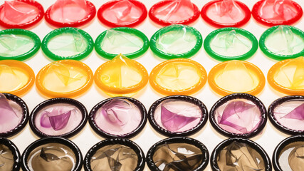 Colorful condoms background.