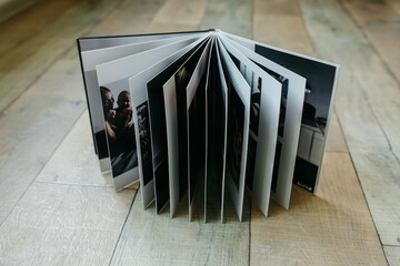 example of a family photo book, high-quality photo print, spread of the book, store memories beautifully in a family album